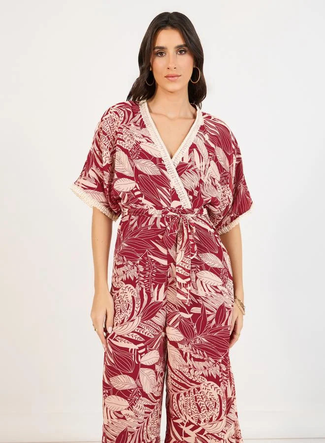 جامپسوت گل‌دار مدل Styli با پاچه گشاد و طراحی جلو پیچ (Front Wrap)