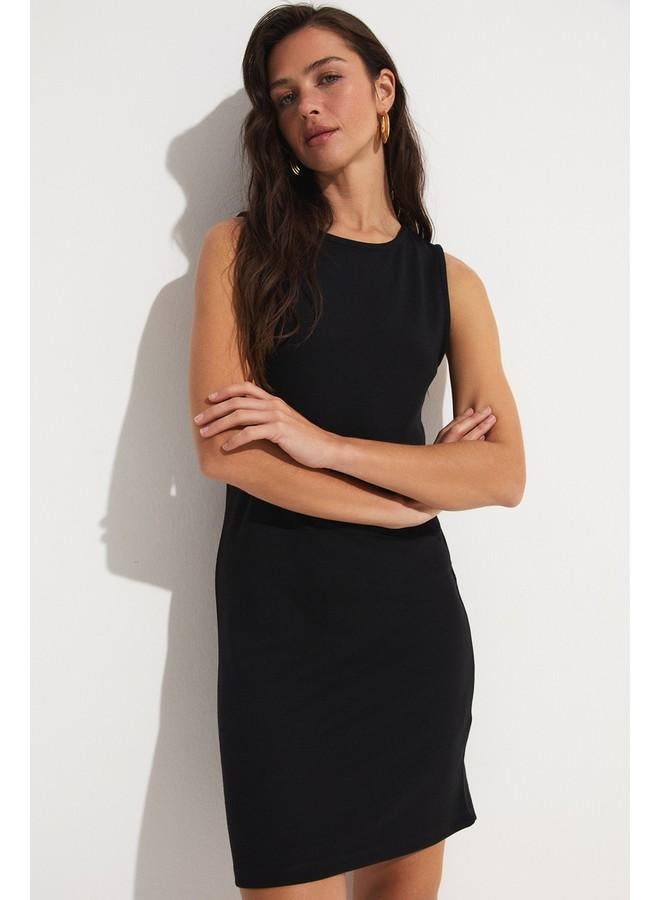 Sleeveless Sheath Dress